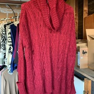 Distressed, slouchy oversized turtleneck